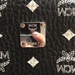 Black/white MCM backpack w/ authentication cards